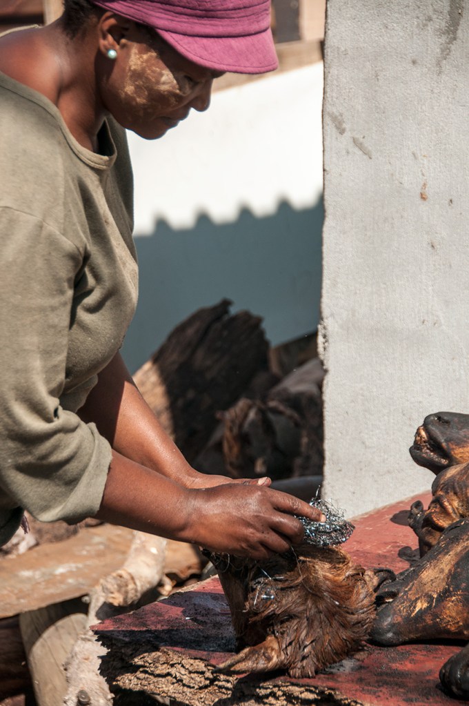 Removing-the-singed-hair.